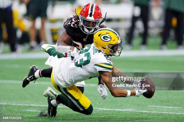 Tre Flowers of the Atlanta Falcons breaks up a pass intended for Samori Toure of the Green Bay Packers during the fourth quarter at Mercedes-Benz...