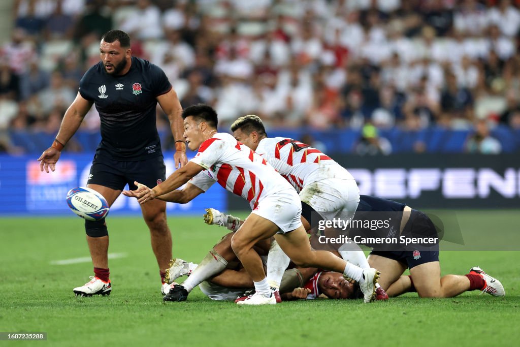Japanese Captain Rugby Naoto Saito of Japan passes the ball during the Rugby World Cup... News ...
