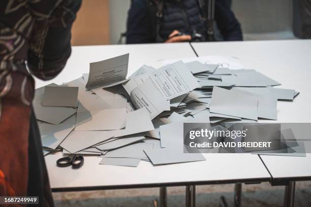 Ballots are spread on a table for counting after closure of the voting during local elections day in the city library of Nordhausen, central Germany,...
