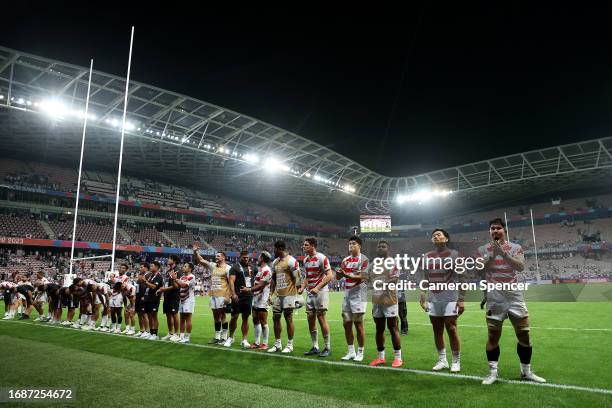 The players of Japan applaud the fans at full-time following the Rugby World Cup France 2023 match between England and Japan at Stade de Nice on...