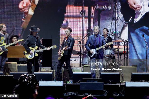 Roger McGuinn, Jakob Dylan of The Wallflowers and Eric Clapton perform onstage during Day 1 of Eric Clapton's Crossroads Guitar Festival at...