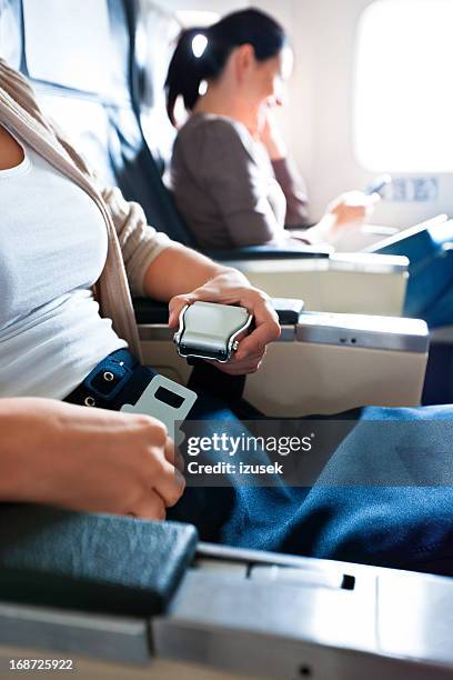 before the flight - seat belt stock pictures, royalty-free photos & images