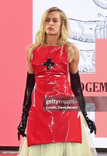Alice Dellal walks the runway at the Pam Hogg show during London Fashion Week September 2023 at New Inn Yard on September 17, 2023 in London, England.