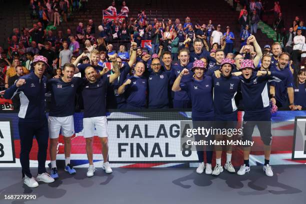 Players and coaches of Team Great Britain pose for a photo after qualifying for the Final 8 of the Davis Cup Finals during the Davis Cup Finals Group...