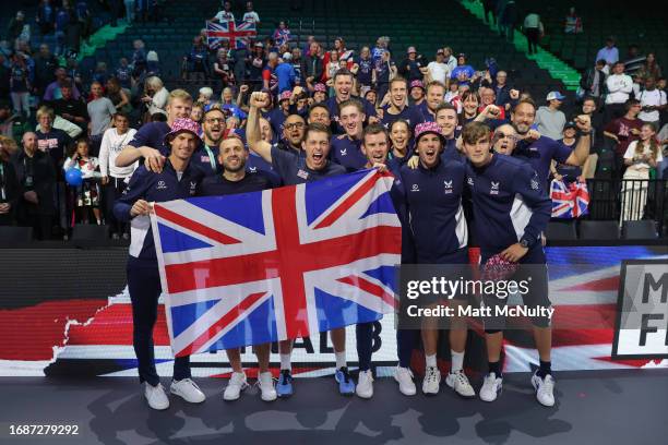 Players and coaches of Team Great Britain pose for a photo after qualifying for the Final 8 of the Davis Cup Finals during the Davis Cup Finals Group...