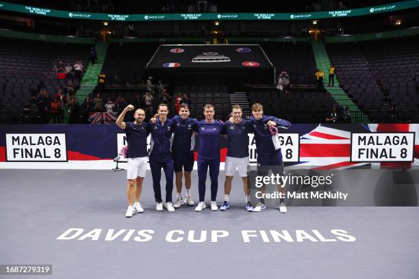 Daniel Evans, Andy Murray, Cameron Norrie, Leon Smith, Neal Skupski and Jack Draper of Team Great Britain pose for a photo after qualifying for the...