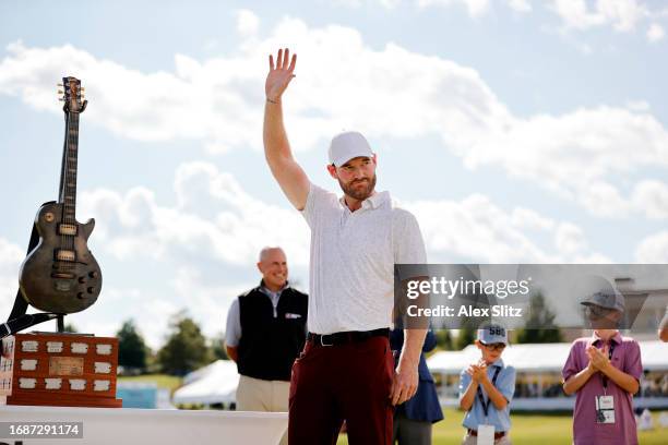 Grayson Murray of the United States reacts during the trophy presentation after winning the Simmons Bank Open for the Snedeker Foundation at The...