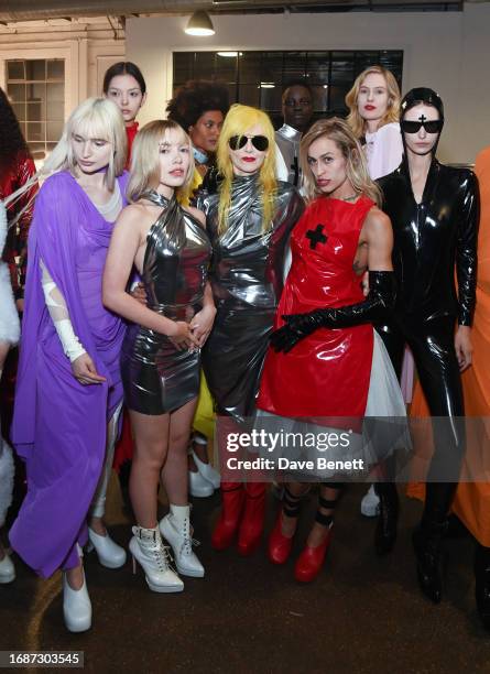Ellie Rae Winstone Pam Hogg and Alice Dellal with models attend the Pam Hogg show during London Fashion Week September 2023 at New Inn Yard on...