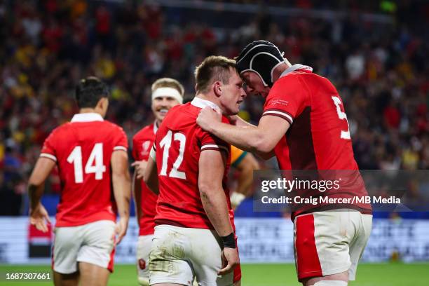 Nick Tompkins of Wales celebrates scoring his sides second try with team mate Adam Beard during the Rugby World Cup France 2023 match between Wales...