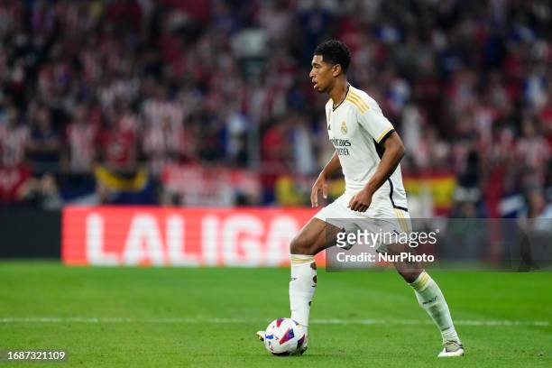 Jude Bellingham central midfield of Real Madrid and England in action during the LaLiga EA Sports match between Atletico Madrid and Real Madrid CF at...