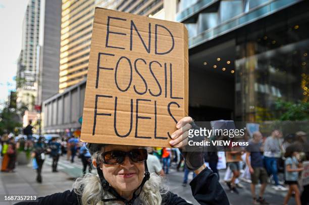 Climate activists attend the march against fossil fuels in midtown Manhattan on September 17, 2023 in New York City. The event in New York is part of...