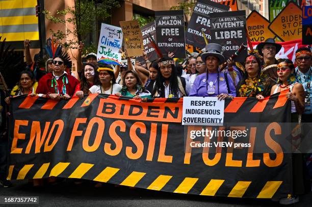 Climate activists attend the march against fossil fuels in midtown Manhattan on September 17, 2023 in New York City. The event in New York is part of...