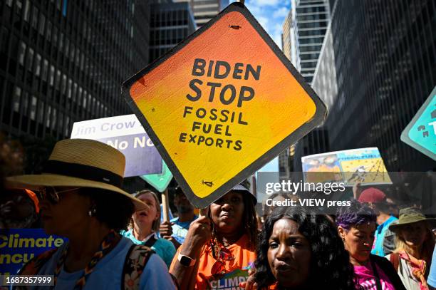 Climate activists attend the march against fossil fuels in midtown Manhattan on September 17, 2023 in New York City. The event in New York is part of...