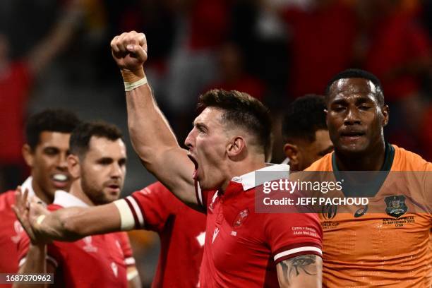 Wales' lock Adam Beard celebrates at the end of the France 2023 Rugby World Cup Pool C match between Wales and Australia at the OL Stadium in...