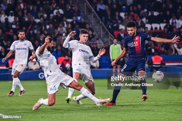 Goncalo RAMOS of PSG and Leonardo BALERDI of Marseille during the Ligue 1 Uber Eats match between Paris Saint-Germain Football Club and Olympique de...