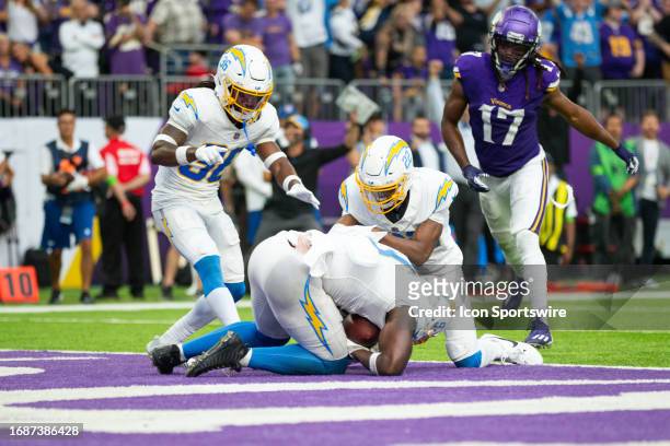 Los Angeles Chargers linebacker Kenneth Murray Jr. Intercepts the football during the NFL game between the Los Angles Chargers and the Minnesota...