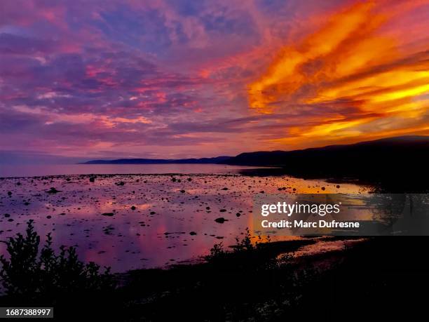 great sunset over st. lawrence river - st lawrence river stock pictures, royalty-free photos & images