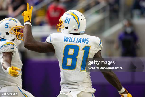 Los Angeles Chargers wide receiver Mike Williams celebrates a touchdown with wide receiver Joshua Palmer during the NFL game between the Los Angles...