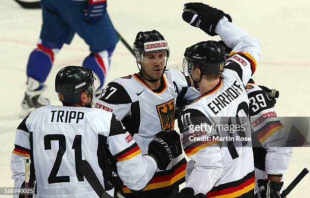 Christoph Ullmann of Germany celebrate with his team mates his team's 1st goal during the IIHF World Championship group H match between France and...