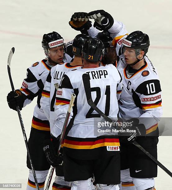 Team members of Germany celebrate their 1st goal during during the IIHF World Championship group H match between France and Germany at Hartwall...