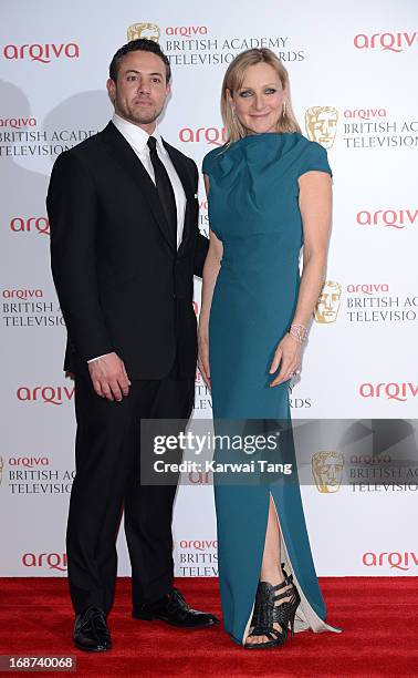 Warren Brown and Lesley Sharp pose in the press room at the Arqiva British Academy Television Awards 2013 at the Royal Festival Hall on May 12, 2013...