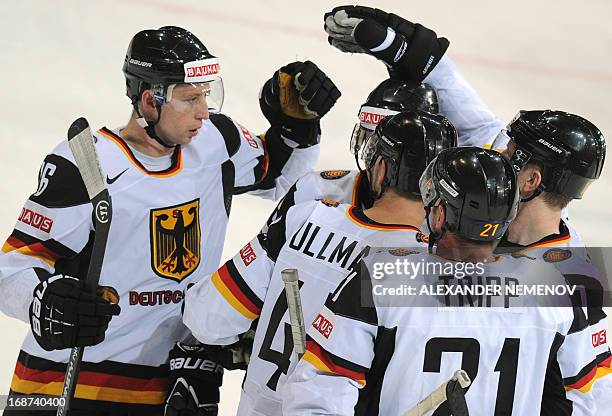 Germany's players celebrate scoring during the preliminary round match France vs Germany of the IIHF International Ice Hockey World Championship in...