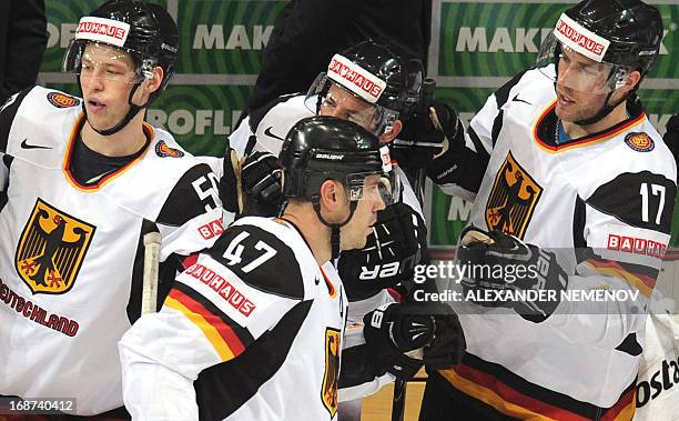 Germany's players celebrate scoring during the preliminary round match France vs Germany of the IIHF International Ice Hockey World Championship in...