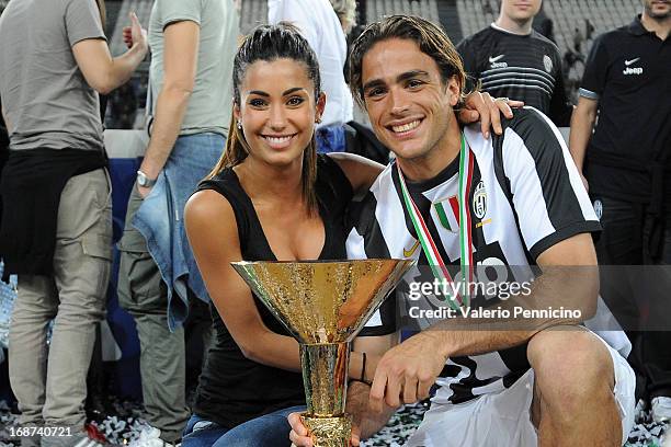Alessandro Matri of Juventus and Federica Nargi celebrate with the Serie A trophy at the end of the Serie A match between Juventus and Cagliari...