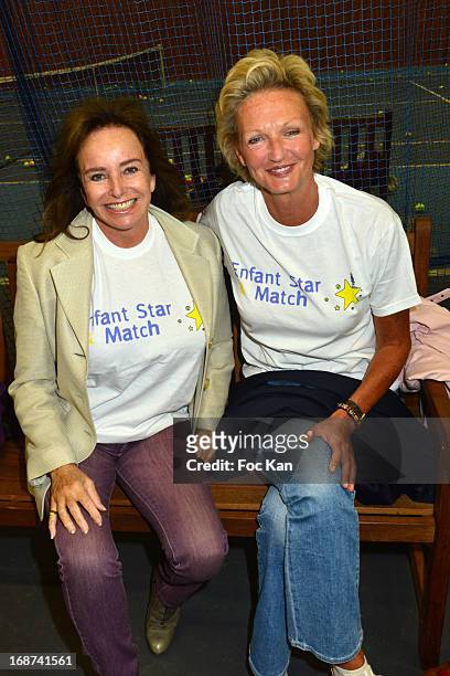 Eleonore de Larochefoucauld and Anne de Bourbon Parme Siciles attend the 'Sourire Gagnant - Enfant Star et Match' Cocktail at the Sporting Club of...
