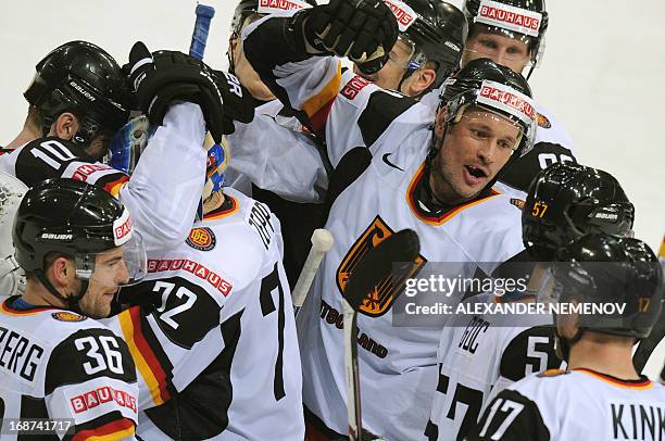 German players celebrate scoring during a preliminary round game France vs Germany of the IIHF International Ice Hockey World Championship in...