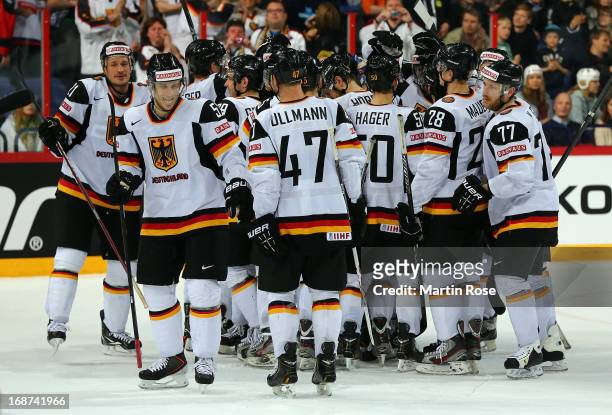 The team of Germany celebrates after the IIHF World Championship group H match between France and Germany at Hartwall Areena on May 14, 2013 in...