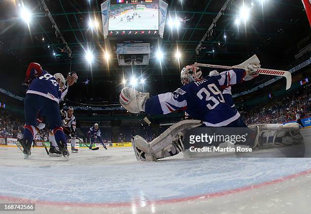 Cristobal Huet , goaltender of France makes a glove save during the IIHF World Championship group H match between France and Germany at Hartwall...