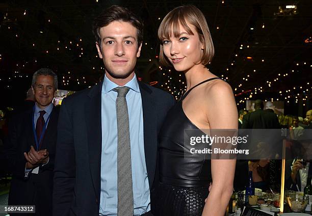 Joshua Kushner, founder of Thrive Capital, left, and model Karlie Kloss attend the Robin Hood Foundation Gala in New York, U.S., on Monday, May 13,...