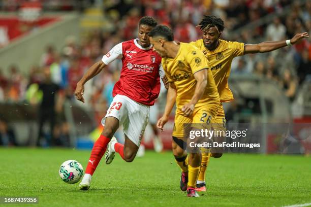 Simon Banza of Braga and Chidozie Awaziem of Boavista in action during the Liga Portugal Bwin match between Sporting Braga and Boavista at Estadio...