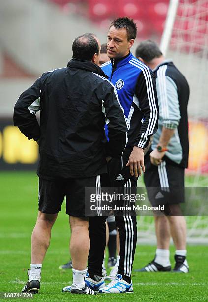 Chelsea Interim Manager Rafael Benitez talks to John Terry of Chelsea during a Chelsea training session ahead of the UEFA Europa League Final match...