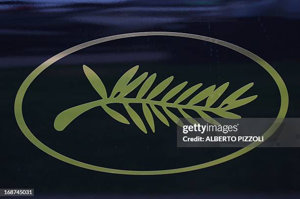 Photo taken on May 14, 2013 shows a Cannes Film Festival logo on a car on the eve of the 66th edition of the Cannes Film Festival. Cannes, one of the...