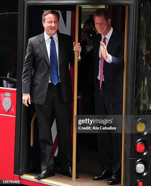 British Prime Minister David Cameron and HRH Prince Harry are seen in the Meat Packing District on May 14, 2013 in New York City.