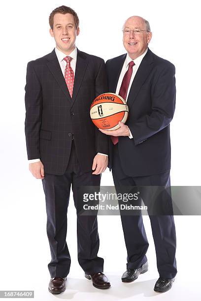 Mike Thibault head coach and Eric Thibault assistant coach of the Washington Mystics poses for a photo during 2013 Washington Mystics media day at...