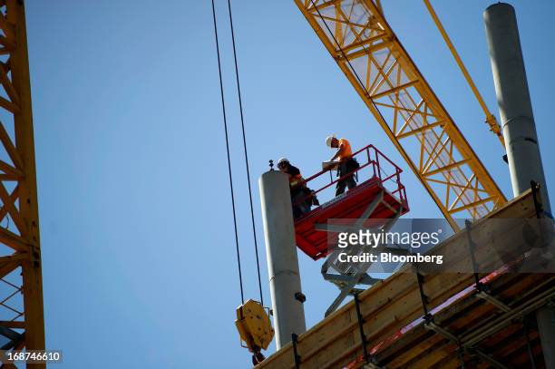 Contractors work at the 279,000 square foot Tishman Speyer Properties LP Foundry Square III construction site on Howard Street in San Francisco,...