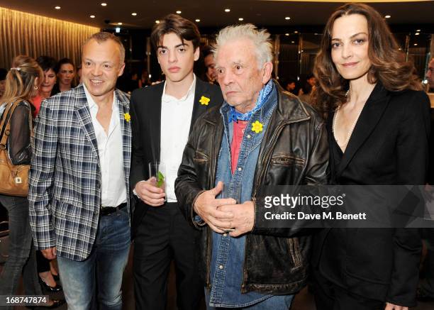 Graham Norton, Sascha Bailey, David Bailey and Catherine Bailey attend the launch of Samsung's NX Smart Camera at a charity auction with David Bailey...