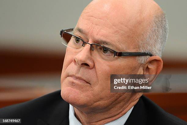 Friend of O.J. Simpson and former sports agent Mike Gilbert testifies during an evidentiary hearing for Simpson in Clark County District Court on May...