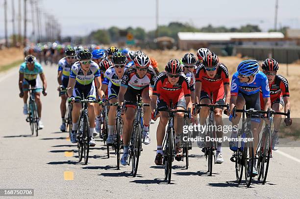 David Zabriskie of the USA riding for Garmin-Sharp and Tejay van Garderen of the USA riding for BMC Racing work at the front of a breakaway of 23...