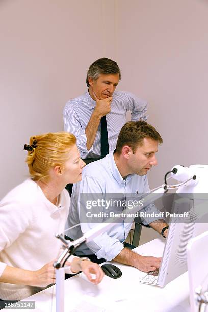 President of L'Opinion Nicolas Beytout and Journalists working whyle 'L'Opinion' Newspaper Launch Party on May 14, 2013 in Paris, France.