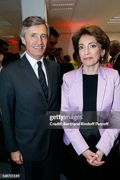 President of L'Opinion Nicolas Beytout and French Minister of Health Marisol Touraine attend 'L'Opinion' Newspaper Launch Party on May 14, 2013 in...