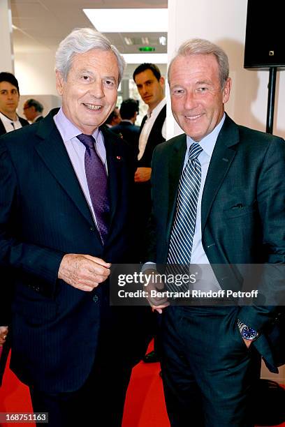 President of Galeries La Fayette Philippe Houze and CEO of L'Opinion Christophe Chenut attend 'L'Opinion' Newspaper Launch Party on May 14, 2013 in...