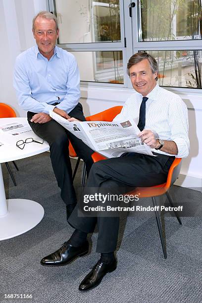 Of L'Opinion Christophe Chenut and President of L'Opinion Nicolas Beytout attend 'L'Opinion' Newspaper Launch Party on May 14, 2013 in Paris, France.