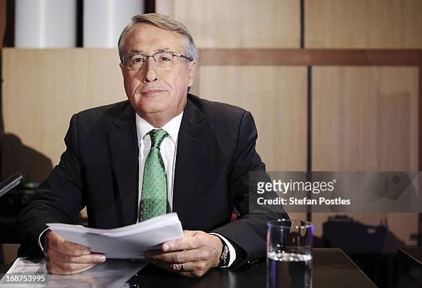 Deputy Prime Minister and Treasurer Wayne Swan prepares to give his post Budget Press Club address in the Great Hall on May 15, 2013 in Canberra,...