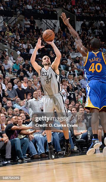 Manu Ginobili of the San Antonio Spurs shoots the ball over Harrison Barnes of the Golden State Warriors during the Game Five of the Western...