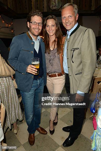 Philip Greffenius and his wife Evelyn and Martin Kolonko attend the 'Tegernsee Tal Braeuhaus' Opening on May 14, 2013 in Munich, Germany.