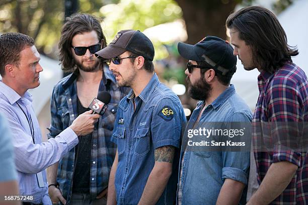 Joe Kane, Rhett Walker, Kenny Davis, and Kevin Whitsett of the Rhett Walker Band attend the GRAMMY Block Party at Owen Bradley Park on May 14, 2013...